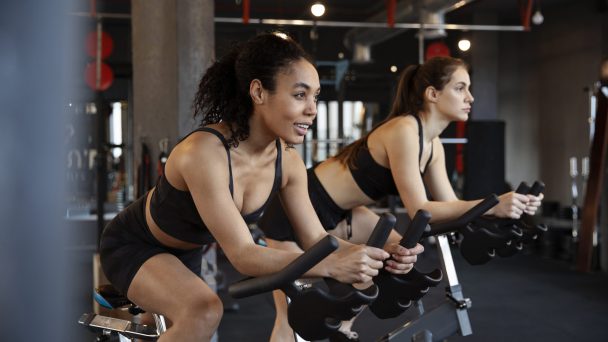 young-women-taking-part-spinning-class